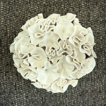 View artwork titled Small Round Wall Piece